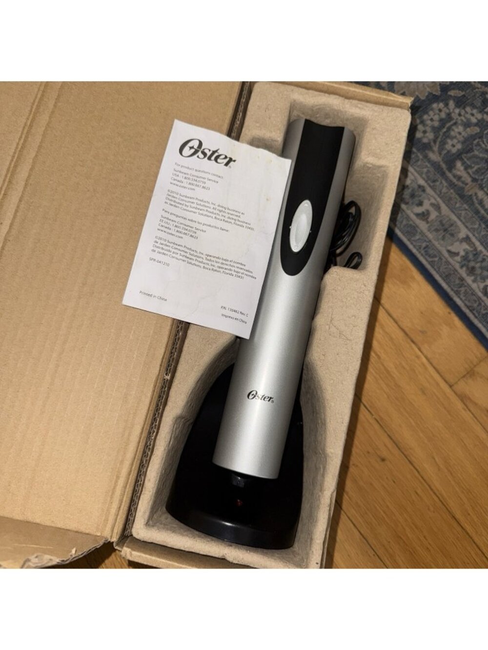 Oster Cordless Electric Wine Bottle Opener with Foil Cutter Plus Bottle Pourer